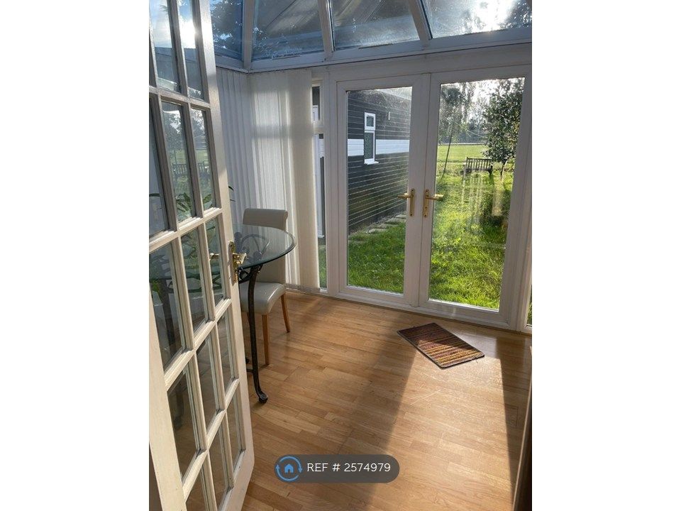 Property photo 3 of 11 Conservatory