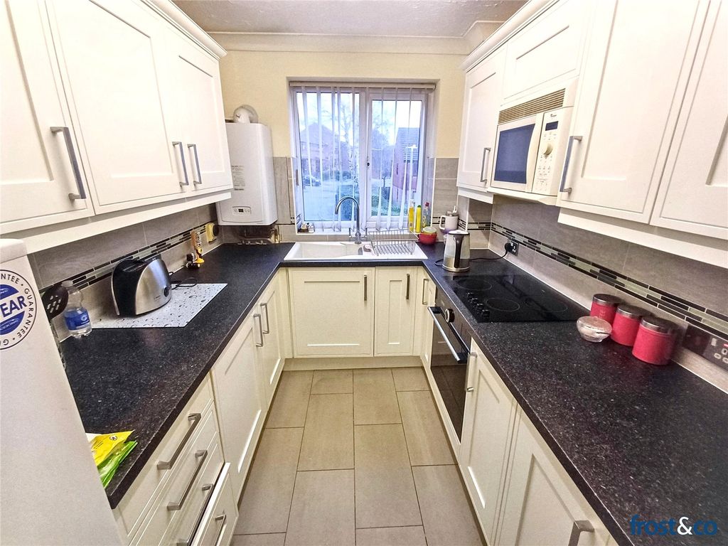 Property photo 3 of 8 Kitchen