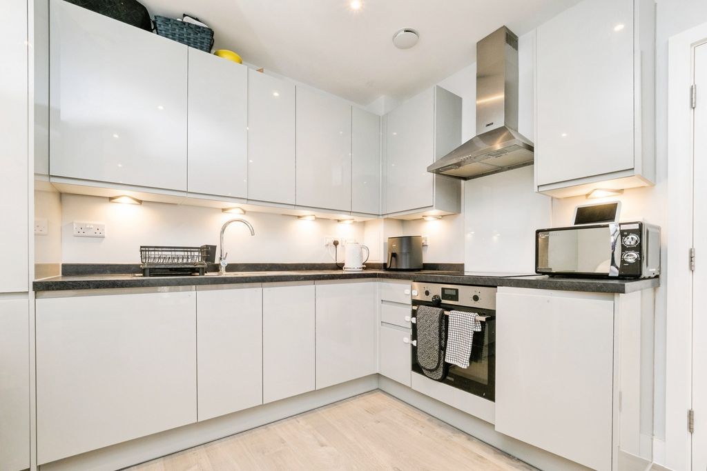 Property photo 2 of 17 Kitchen Area