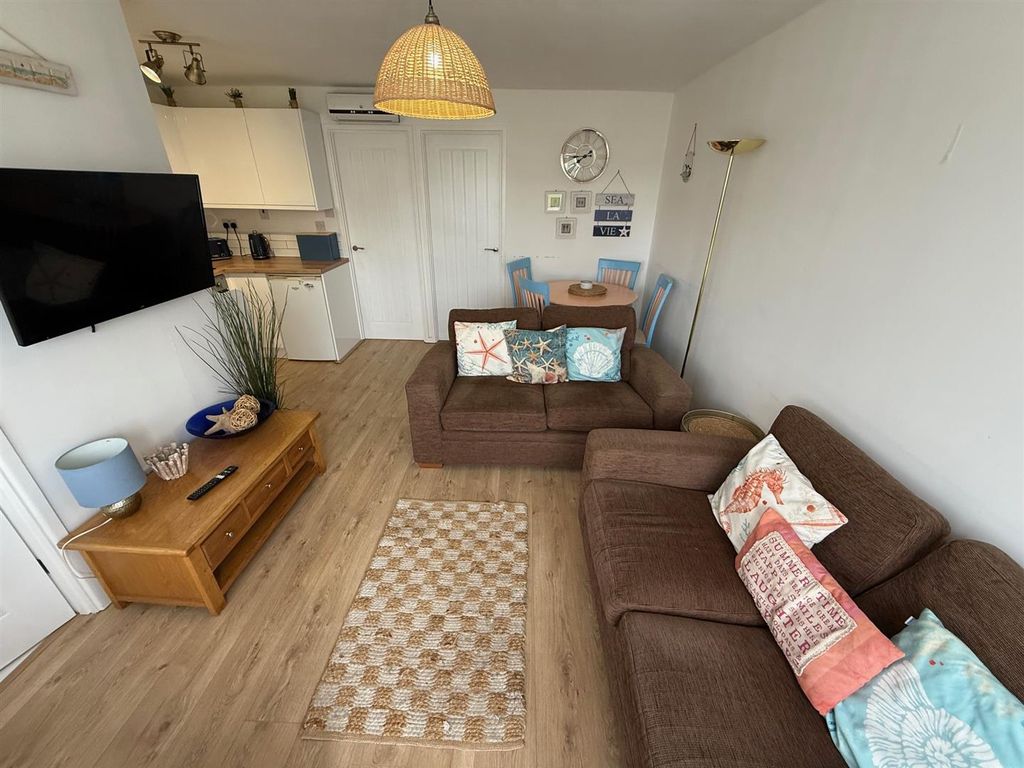 Property photo 2 of 8 Living Area