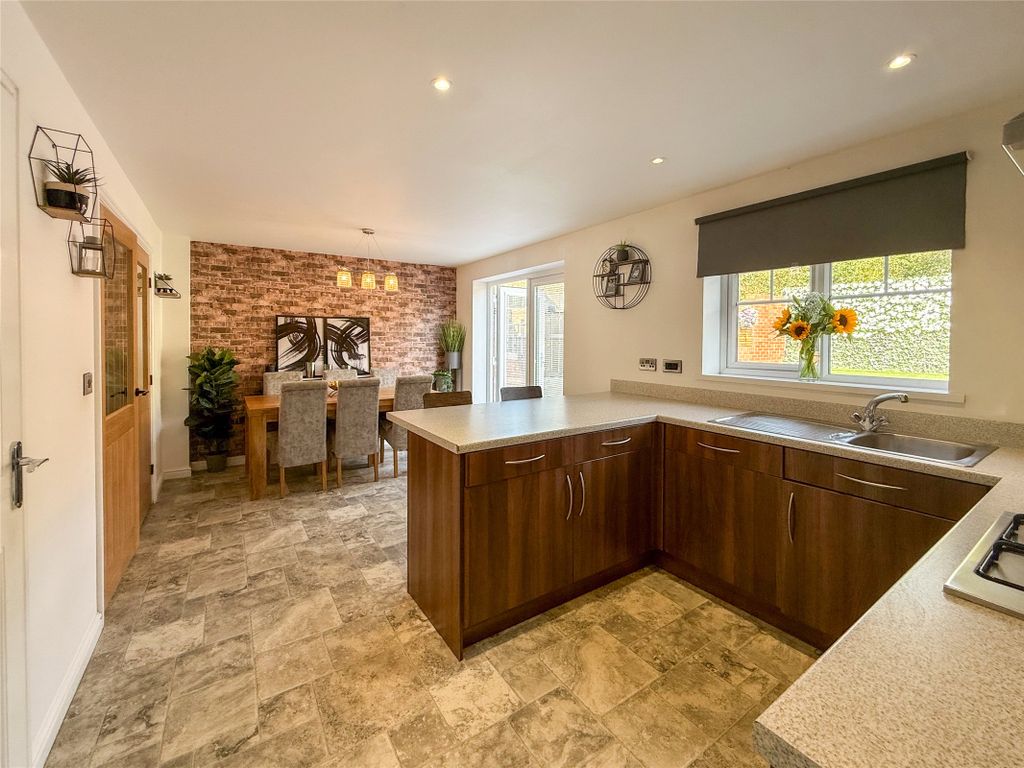 Property photo 3 of 26 Dining Kitchen