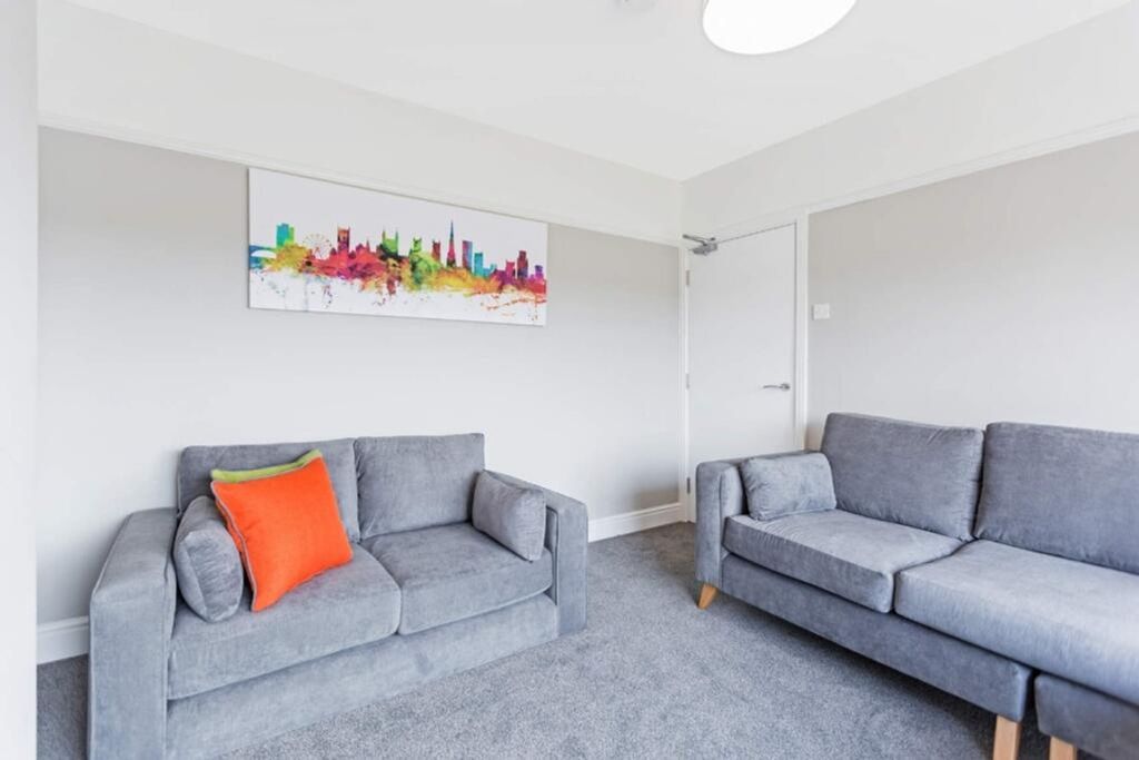 Property photo 3 of 14 Bright And Inviting Living Room Featuring Modern F...