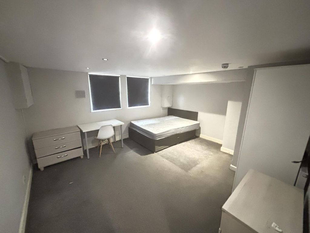 Property photo 3 of 16 A Bright And Tidy Bedroom Featuring A Comfortable ...