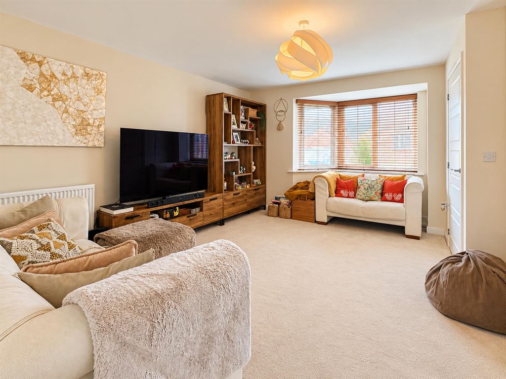 Property photo 2 of 22 Cozy Walnut-Toned Living Room Retreat.Png