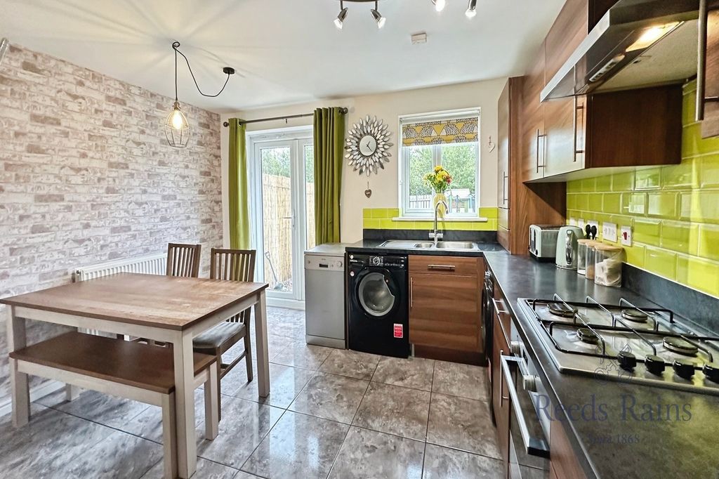 Property photo 2 of 12 Kitchen Dining