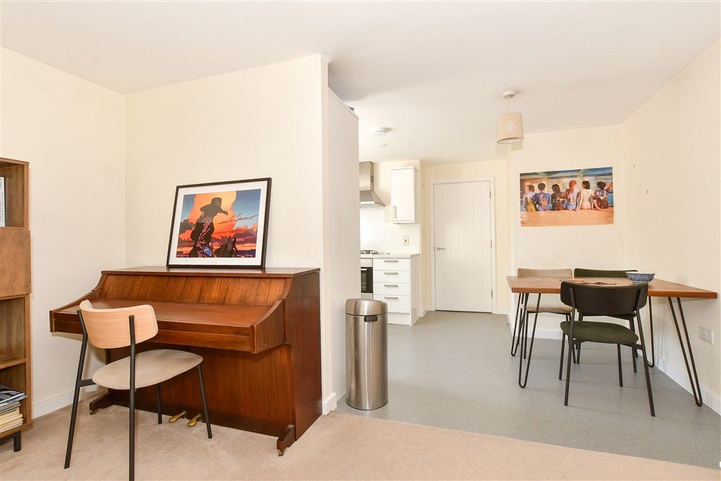 Property photo 3 of 12 Lounge/Dining Area