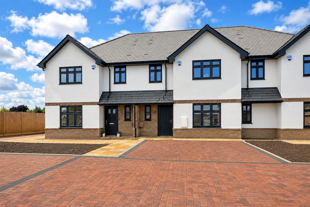 Property photo 1 of 42 Rosewood Front 1-3.Jpg
