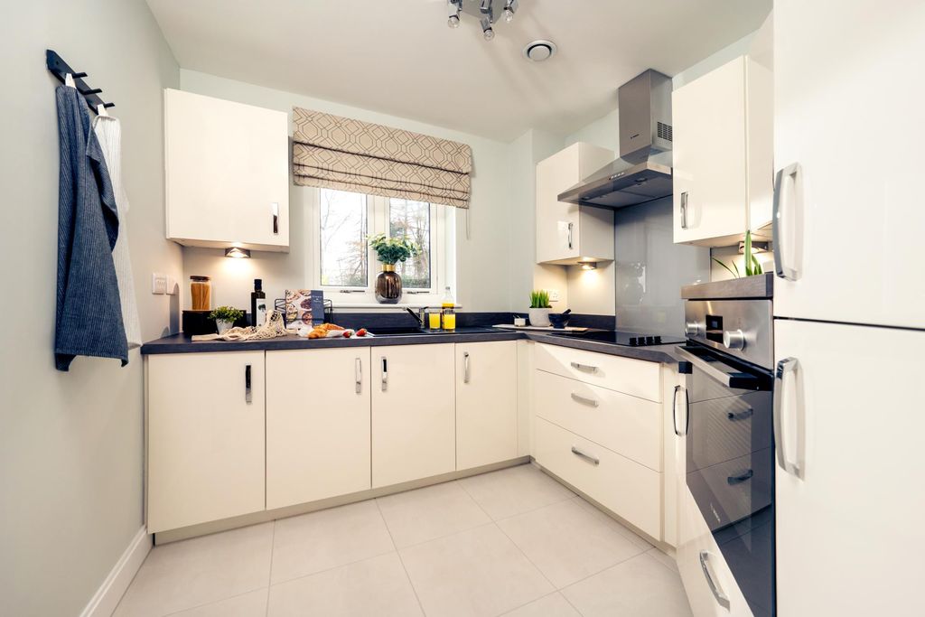 Property photo 3 of 12 Show Apartment Kitchen