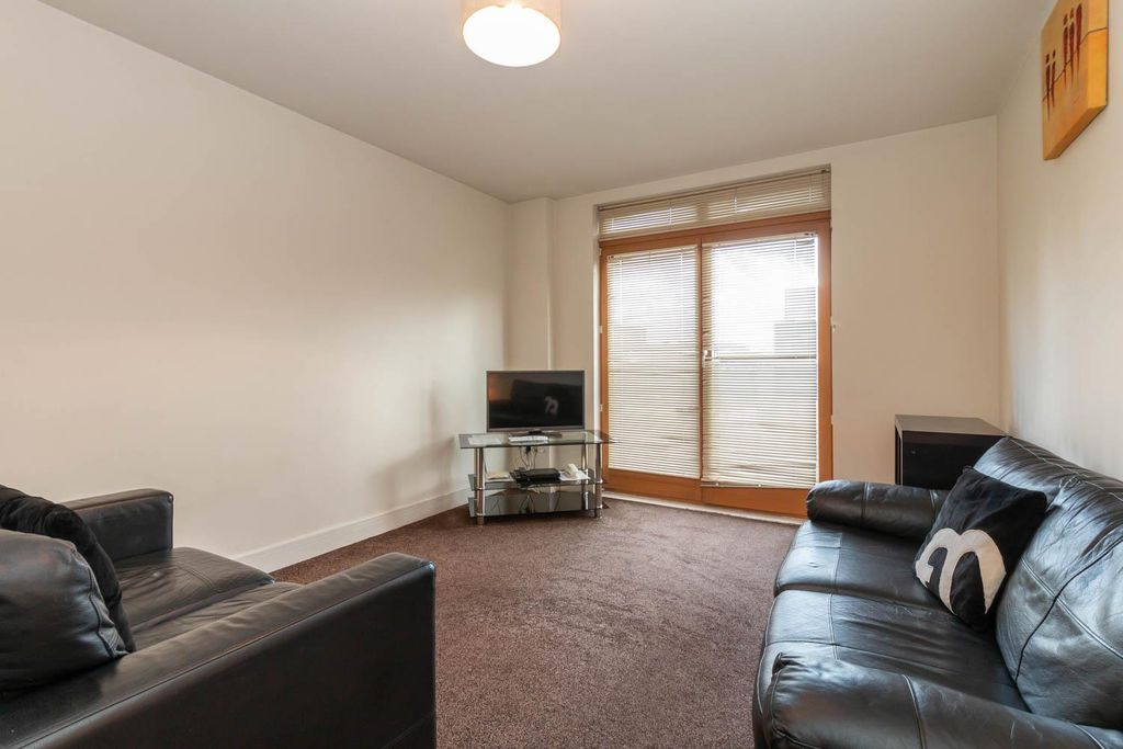 Property photo 1 of 12 Living Area