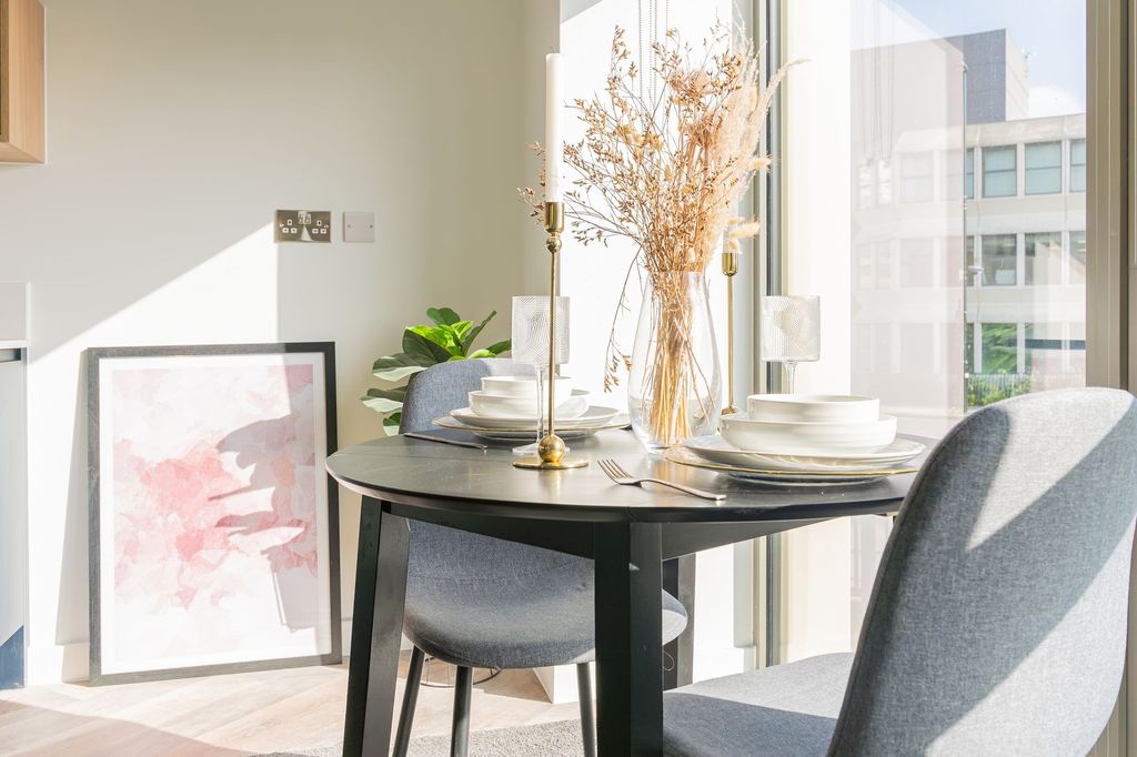 Property photo 3 of 7 Bright And Modern Kitchen Dining Area Featuring A ...