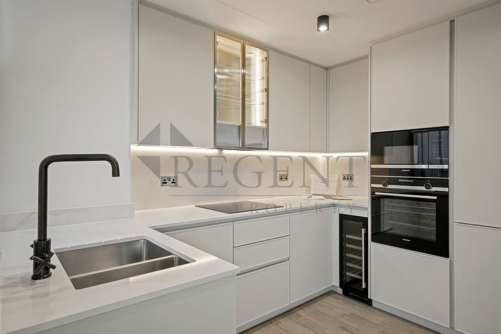 Property photo 3 of 12 Kitchen