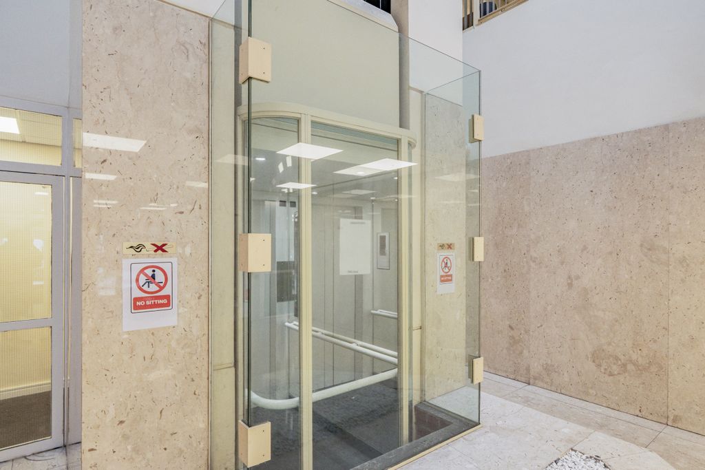 Property photo 2 of 7 Glass Fronted Wall Climbing Lift