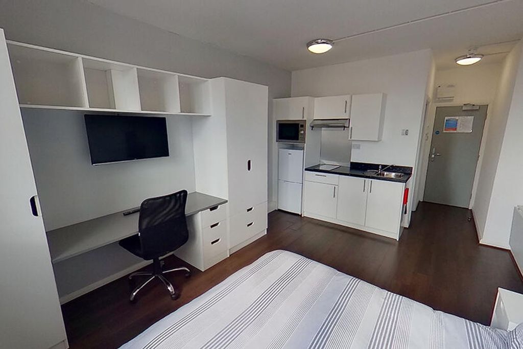 Property photo 3 of 4 This Stylish Double Bedroom Features A Modern Desk...