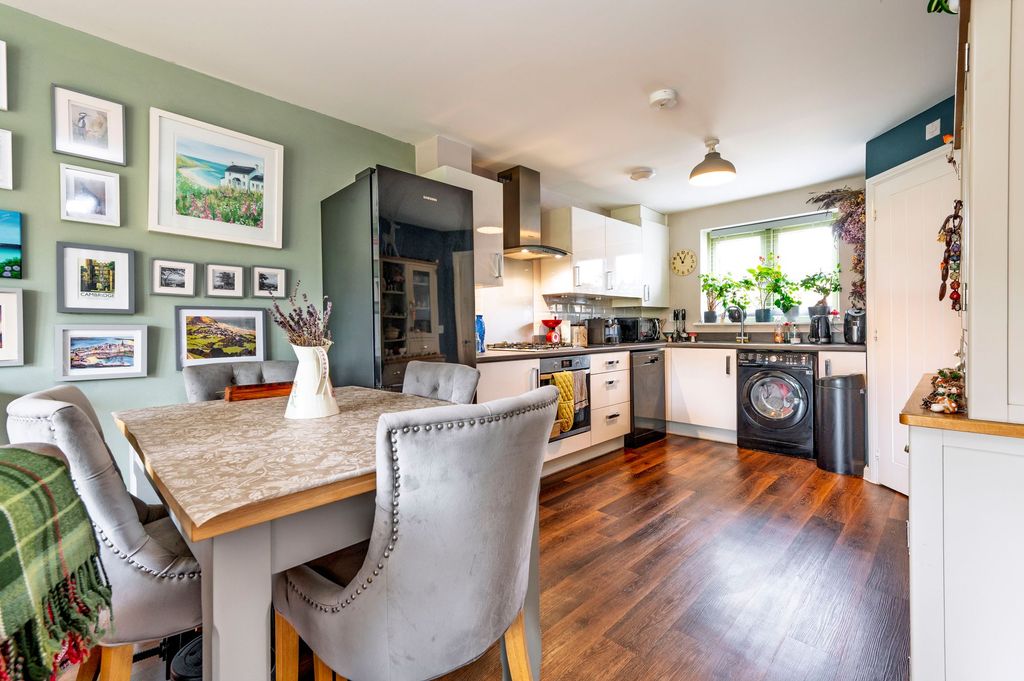 Property photo 3 of 16 Kitchen &amp; Dining Area