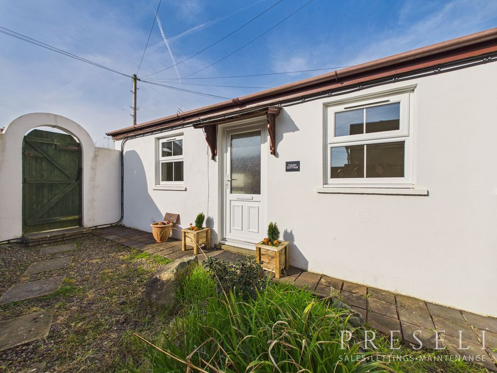 Property photo 1 of 12 Front Exterior