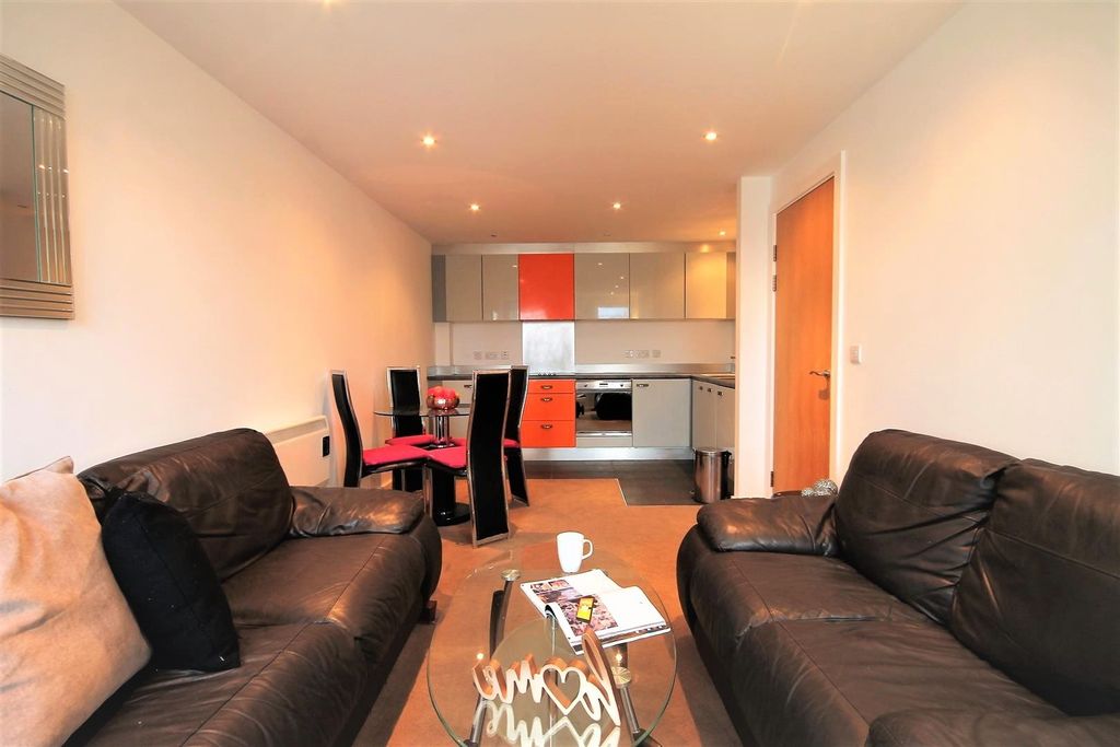 Property photo 3 of 15 Bright And Cozy Living Room With Modern Furnishing...
