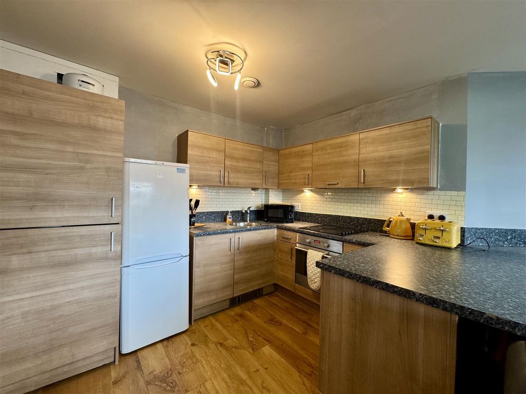 Property photo 1 of 7 Kitchen