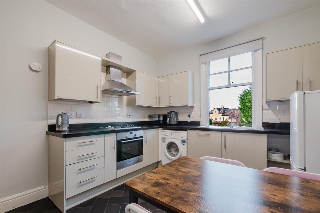 Property photo 2 of 12 Kitchen