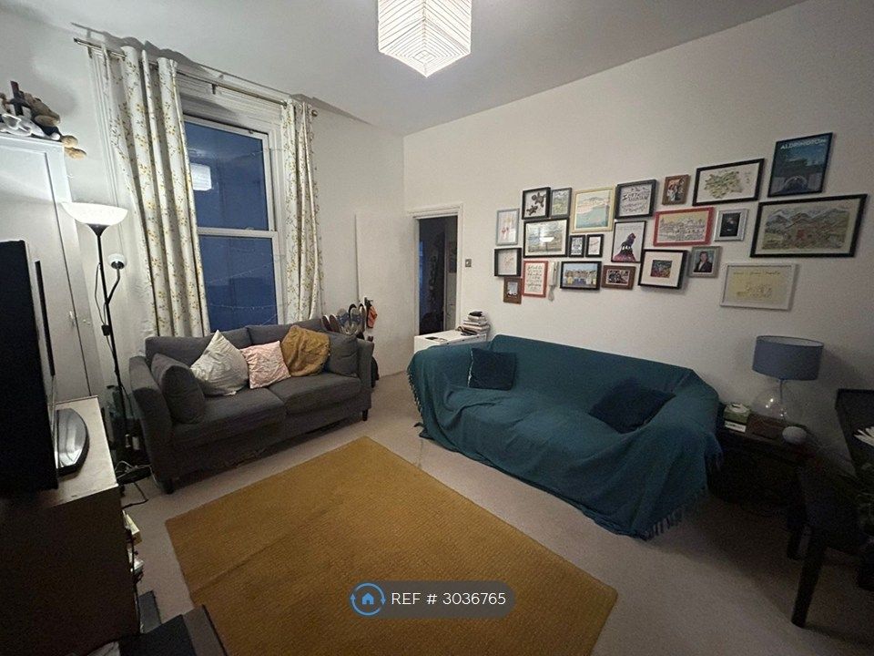 Property photo 2 of 15 Pleasant Living Room With Large Window