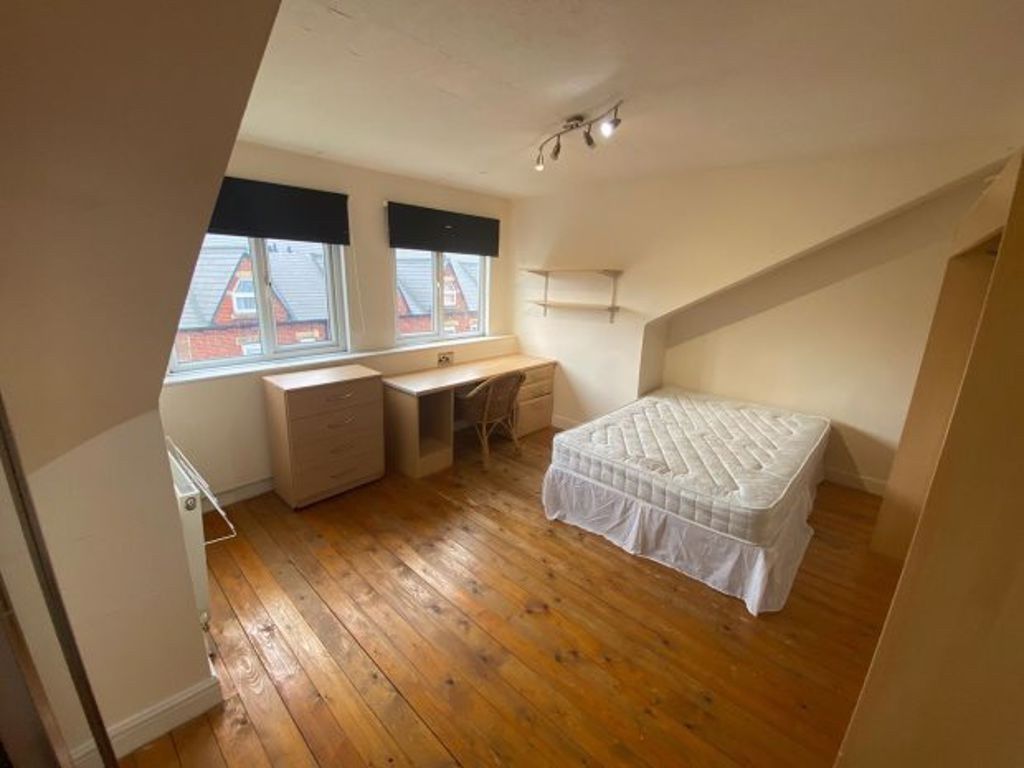 Property photo 1 of 12 Bright And Spacious Master Bedroom Featuring Natur...