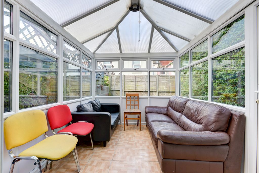 Property photo 1 of 15 Bright And Inviting Sunroom With Large Windows Tha...