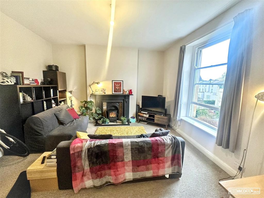 Property photo 3 of 6 Bright Living Area With Large Windows And Hearth...