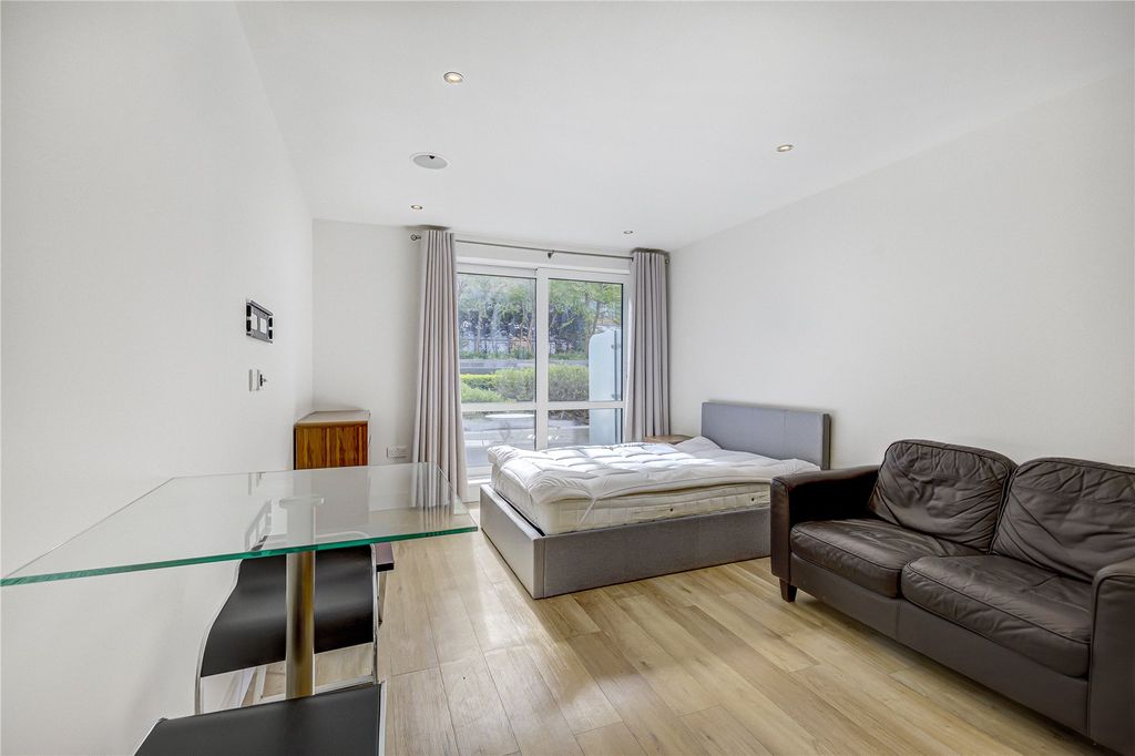 Property photo 1 of 8 Living Area