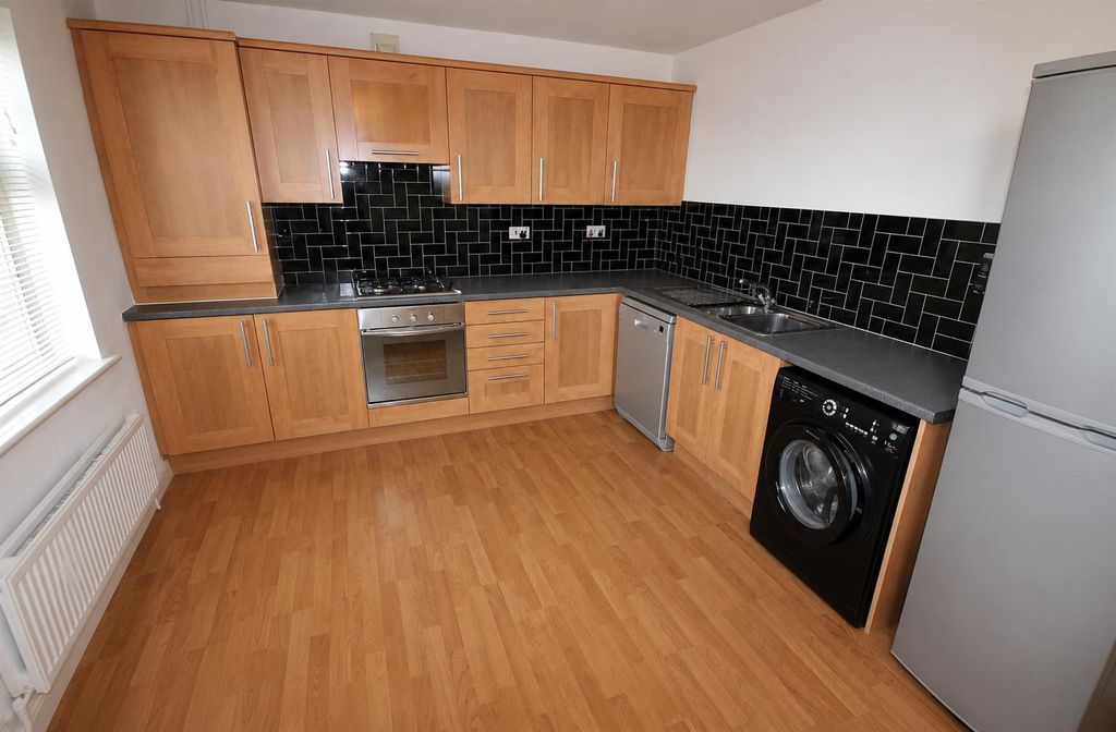 Property photo 3 of 7 Kitchen Area