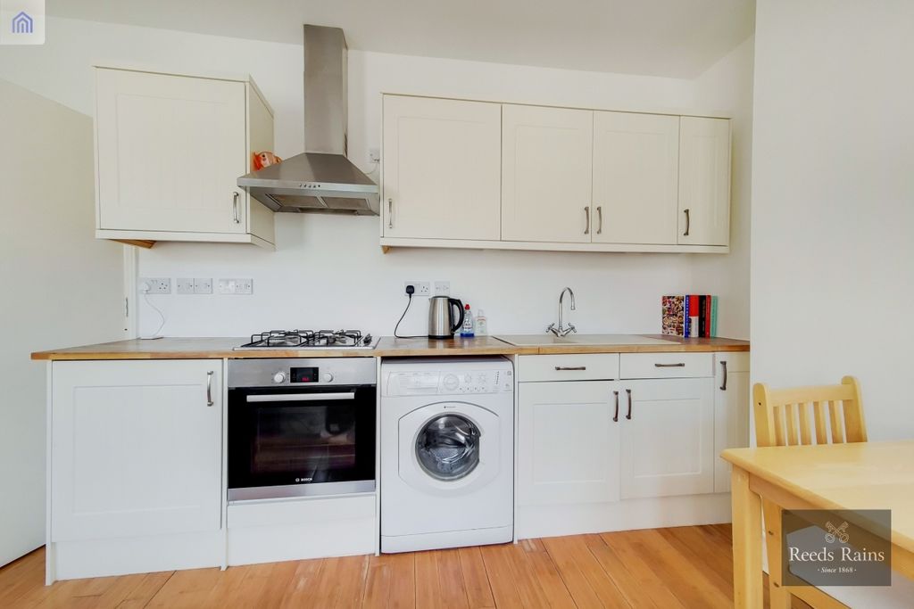 Property photo 2 of 11 Kitchen Area
