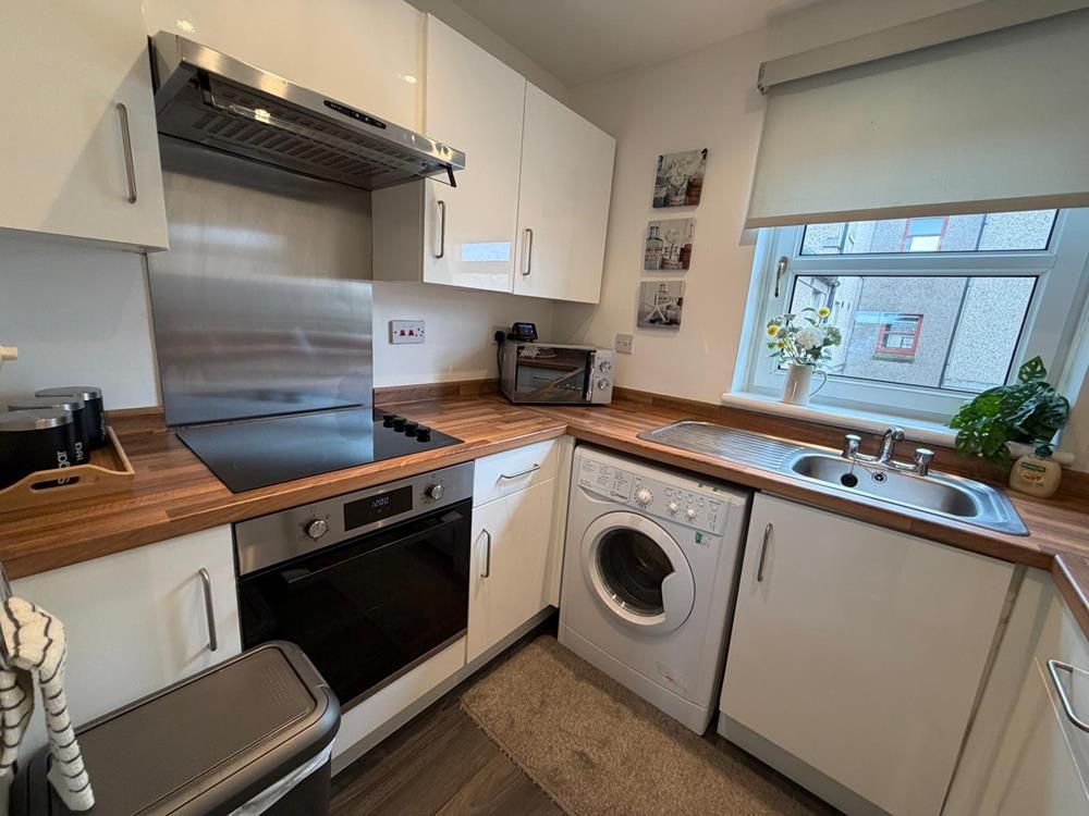 Property photo 2 of 9 Kitchen