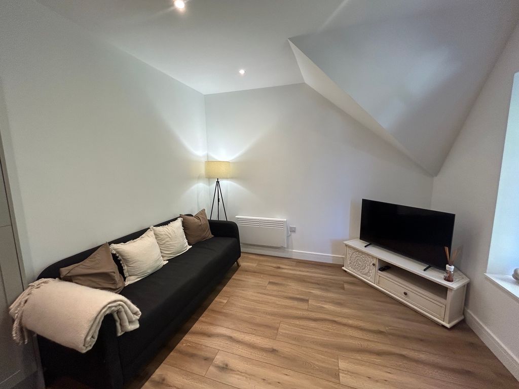 Property photo 1 of 11 Living Area