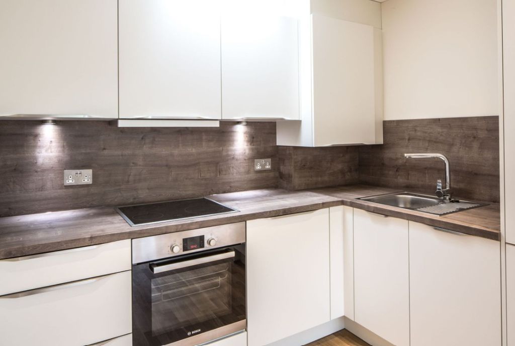 Property photo 3 of 8 Kitchen