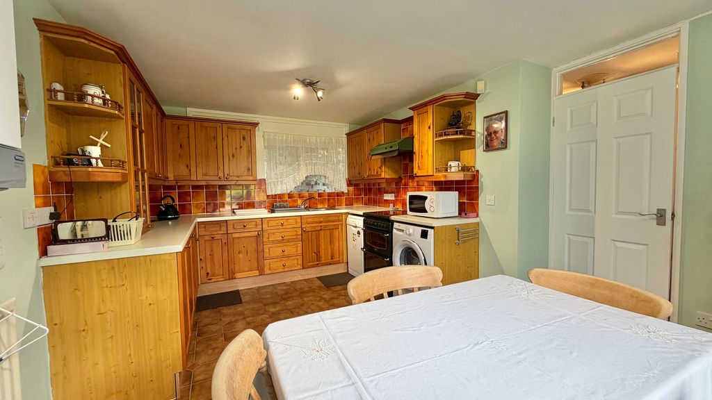 Property photo 3 of 13 Dining Kitchen