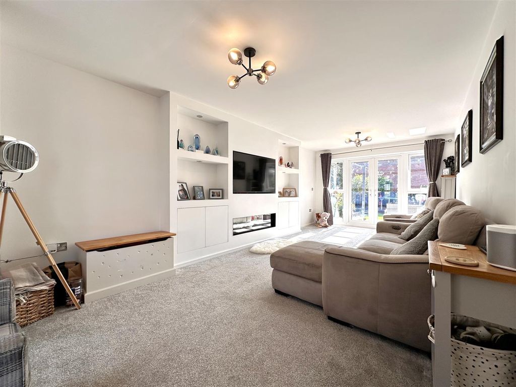 Property photo 2 of 26 Generous Living Room With Media Wall 440