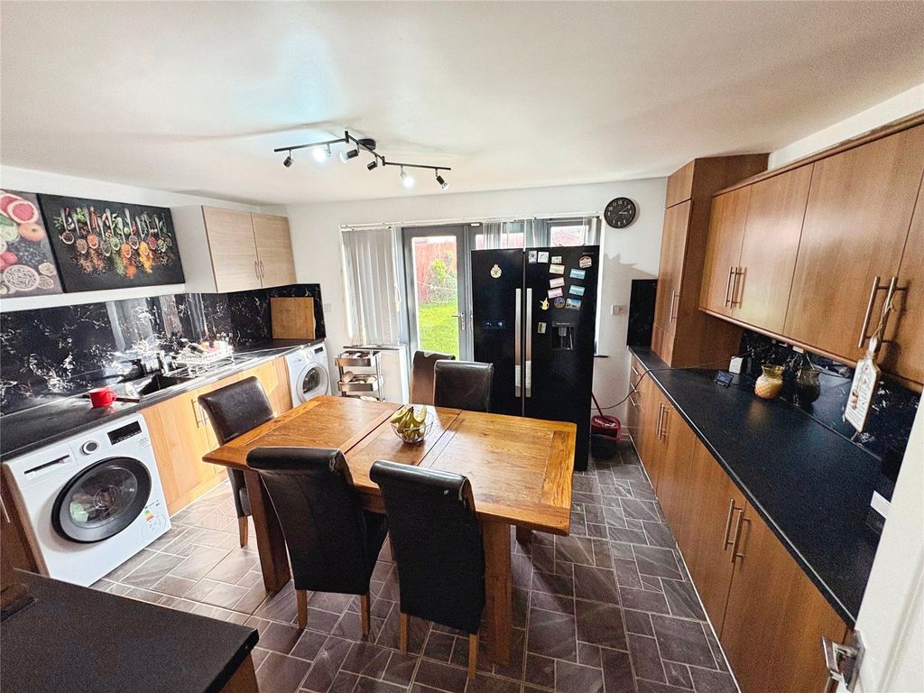 Property photo 2 of 12 Dining Kitchen