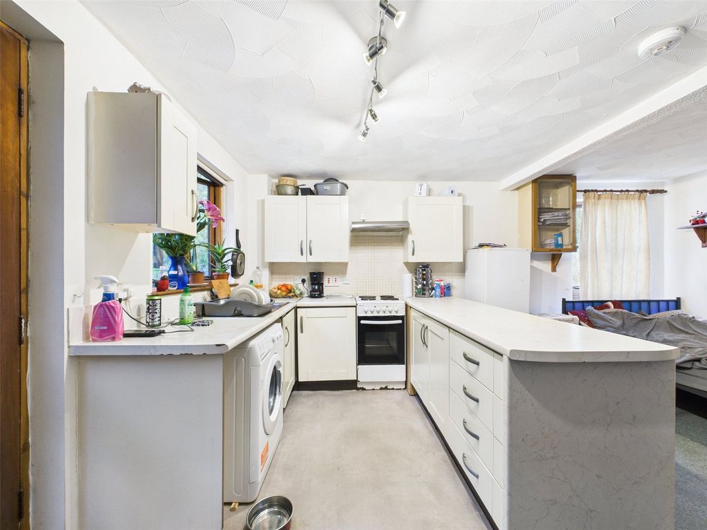 Property photo 3 of 7 Kitchen Area