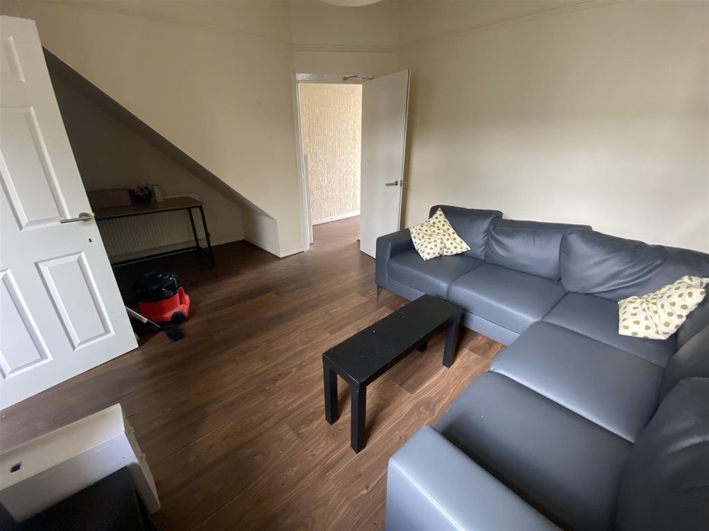 Property photo 2 of 12 Spacious Lounge With A Large Corner Sofa...