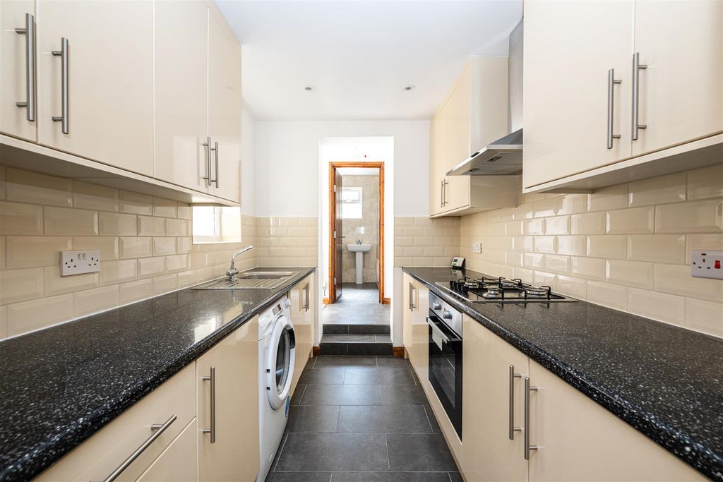 Property photo 3 of 12 Kitchen