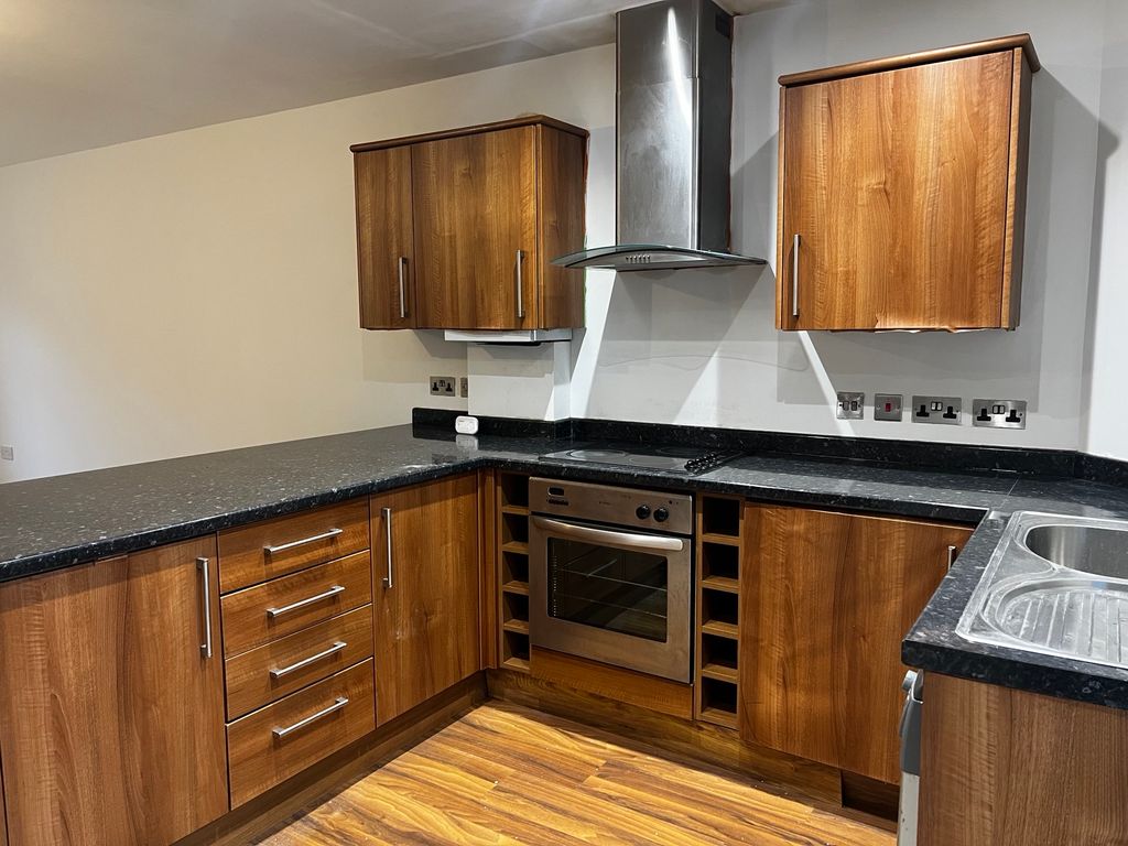 Property photo 3 of 9 Kitchen