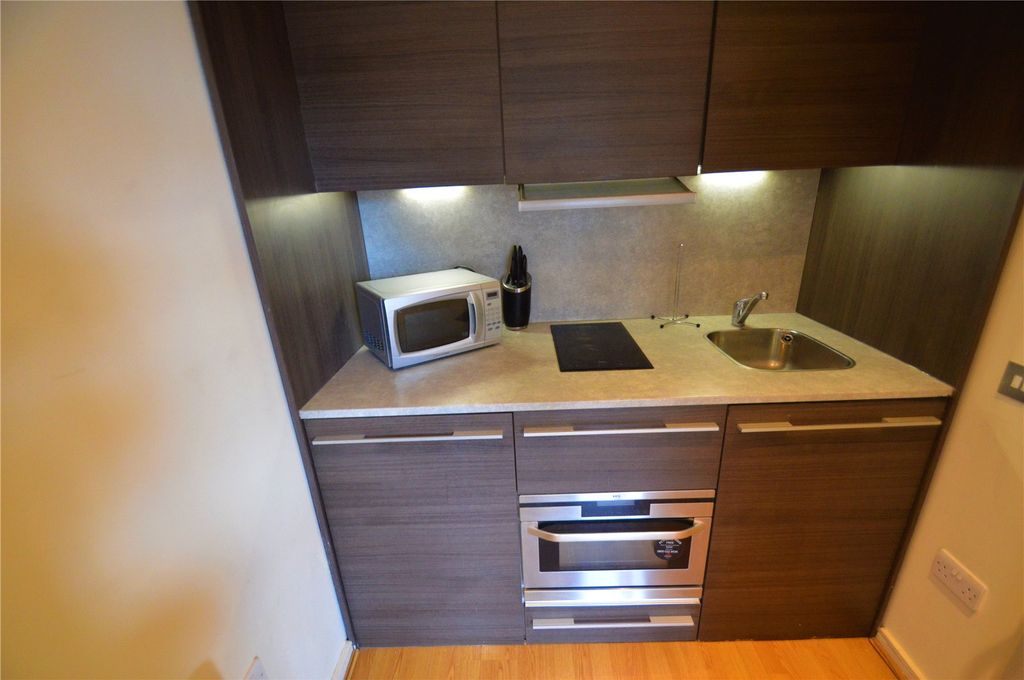 Property photo 3 of 8 Kitchen