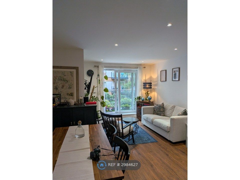 Property photo 1 of 11 Living + Dining 1