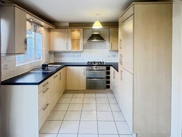 Property photo 3 of 12 Kitchen