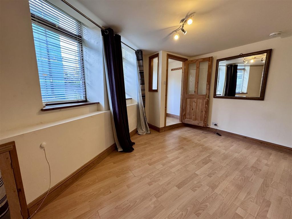 Property photo 2 of 9 Living Area