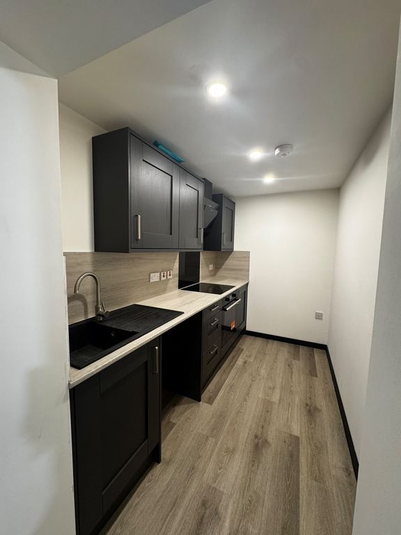 Property photo 1 of 6 Kitchen