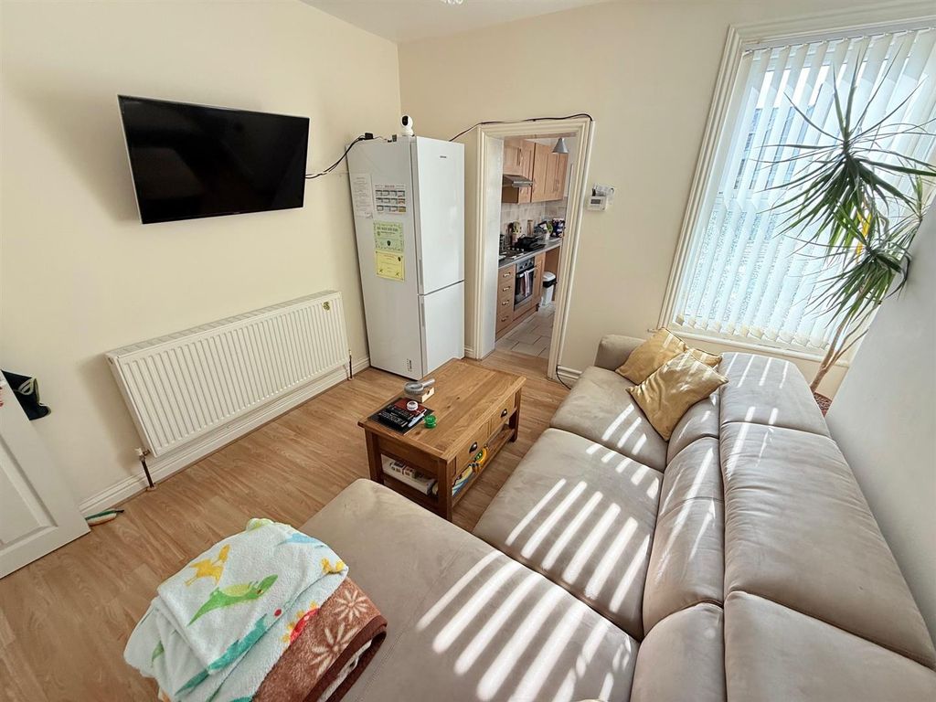 Property photo 2 of 12 Living Room.Jpg