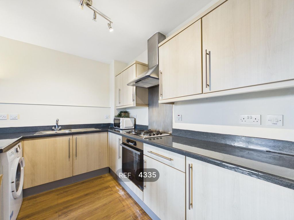 Property photo 3 of 10 Kitchen/Living Area