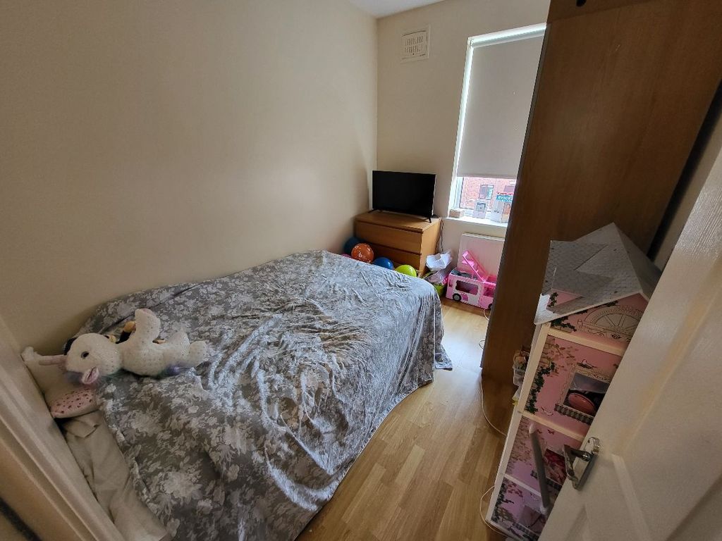 Property photo 3 of 6 A Cozy Single Bedroom Featuring A Bed With Plush B...