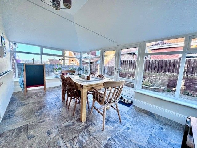 Property photo 3 of 16 Conservatory