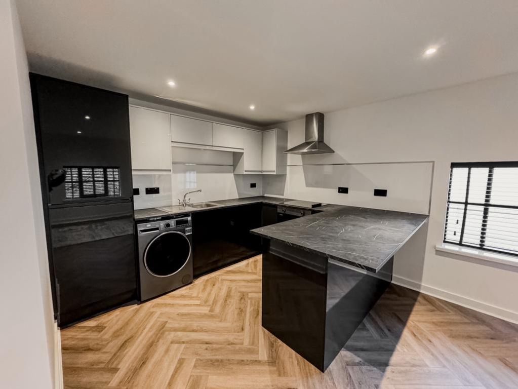 Property photo 3 of 9 Kitchen