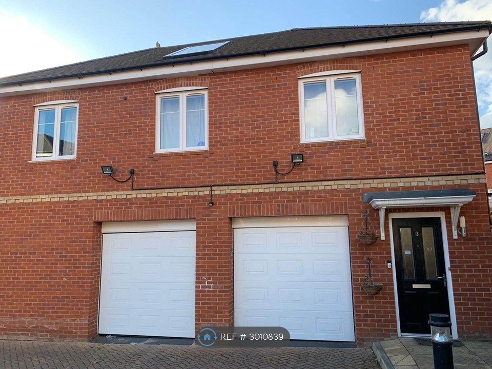 Property photo 1 of 9 Front Of The House With Garage